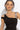 BLACK COTTON MIDI DRESS WITH ASYMMETRICAL SHOULDERS AND STRAP BAROQUE PEARL - ESSENTIALS JIORO ПАМУЧНА МИДИ РОКЛЯ С АСИМЕТРИЧНИ РАМЕНЕ И ПРЕЗРАМКА BAROQUE PEARL - ESSENTIALS JIORO