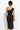 BLACK COTTON MIDI DRESS WITH ASYMMETRICAL SHOULDERS AND STRAP BAROQUE PEARL - ESSENTIALS JIORO ПАМУЧНА МИДИ РОКЛЯ С АСИМЕТРИЧНИ РАМЕНЕ И ПРЕЗРАМКА BAROQUE PEARL - ESSENTIALS JIORO