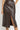 ASYMMETRIC A-LINE SKIRT IN LEATHER-EFFECT BROWN - ESSENTIALS JIORO АСИМЕТРИЧНА ПОЛА А-ЛИНИЯ С ЕФЕКТ НА КОЖА В КАФЯВО - ESSENTIALS JIORO