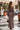 LONG FLORAL LACE DRESS WITH OFF-SHOULDER NECKLINE IN MOCHA - ESSENTIALS JIORO ДЪЛГА ДАНТЕЛЕНА РОКЛЯ В МОКА С ПАДНАЛИ РАМЕНА - ESSENTIALS JIORO