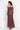ASYMMETRIC LUREX DRESS WITH KNOT DETAIL AND FRONT DRAWSTRING - BURGUNDY LOGO JIORO АСИМЕТРИЧНА РОКЛЯ ОТ ЛУРЕКС С ВЪЗЕЛ - BURGUNDY LOGO JIORO