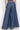 HIGH-WAISTED FLARED DENIM PANTS WITH FRONT SLITS - ESSENTIALS JIORO ПАНТАЛОН ОТ ТЪНЪК ДЕНИМ С ВИСОКА ТАЛИЯ И ЦЕПКИ – ESSENTIALS JIORO